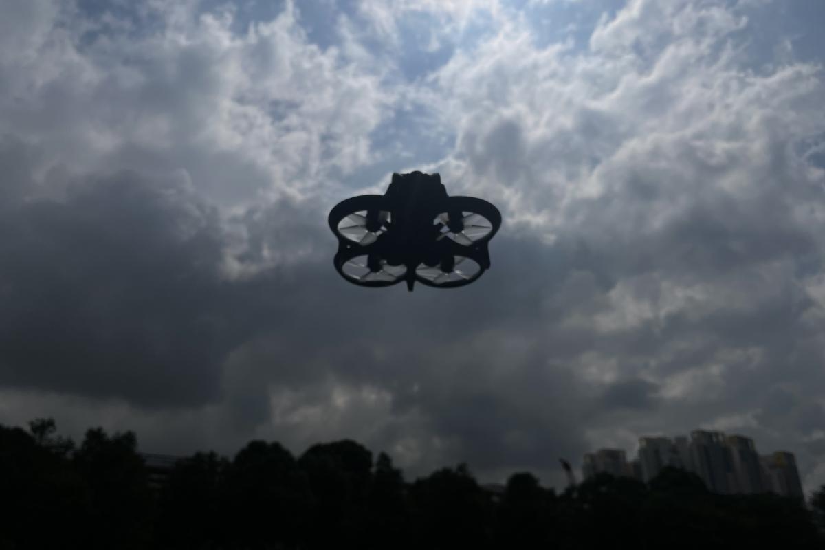 a drone flies in the sky